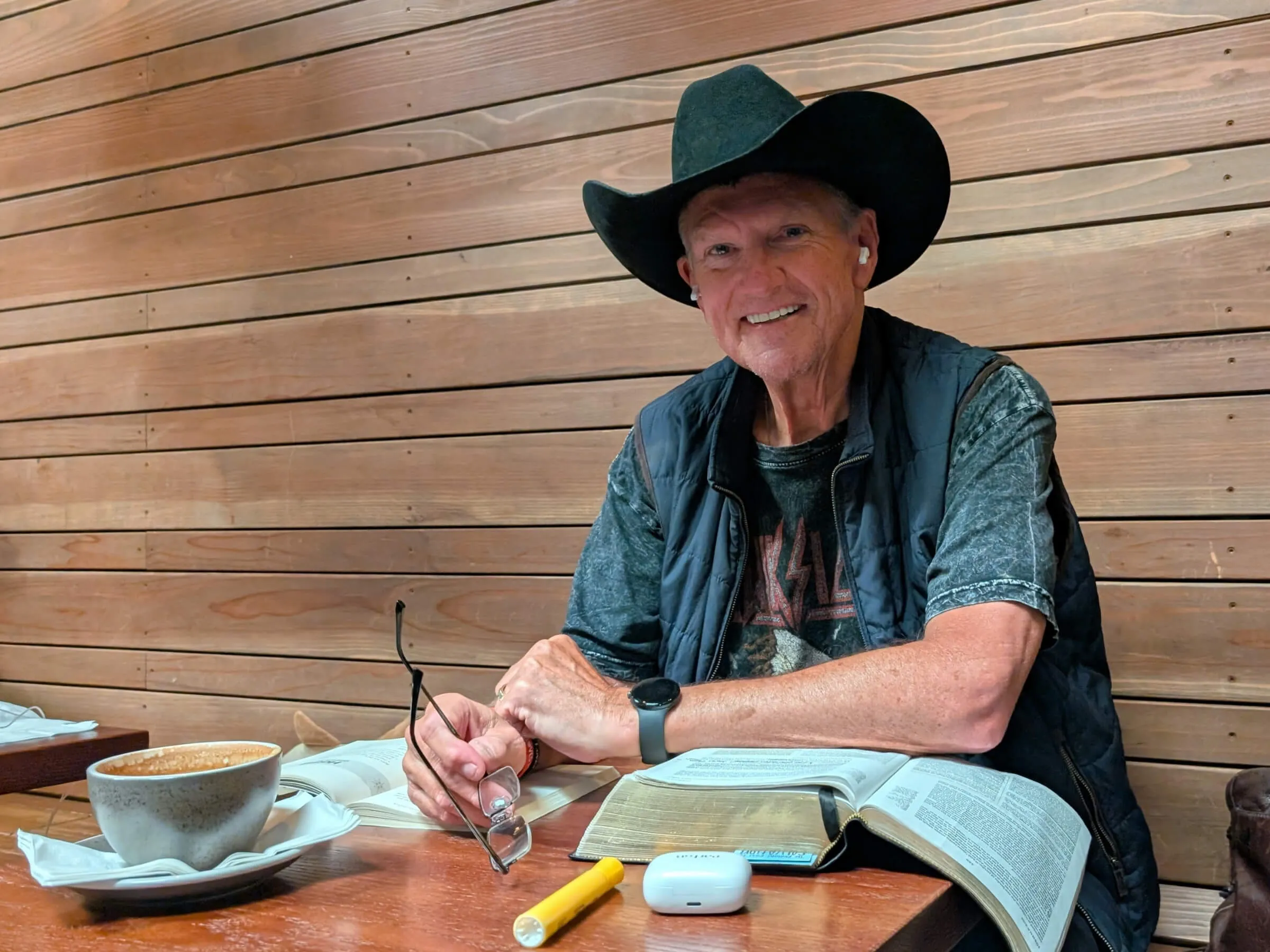 Jeff Buckner reading thoughtfully at Jaunt Coffee